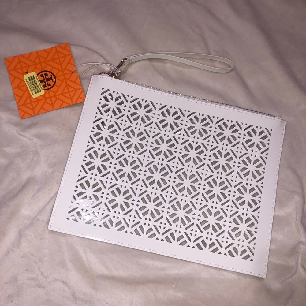 TORY BURCH EYELET CLUTCH
